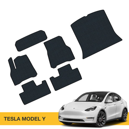 Czarne dywaniki z EVA do samochodu, dopasowane do modelu Tesla Y, z wyraźnym wzorem.
